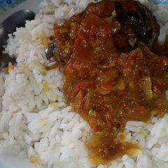 A picture of Rice and stew with fish #Mukomakitchen.
