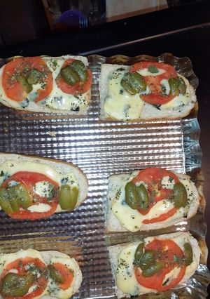 Una foto de Pizzetas con espinaca: