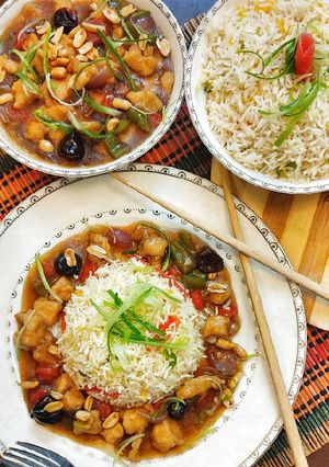 A picture of Kungpao chicken with fried rice in one hour.