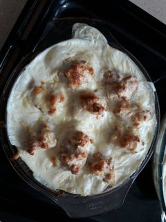 Una foto de Huevos rellenos de carne picada con bechamel