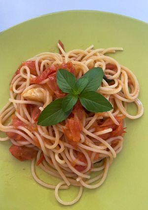 Una foto de Spaghetti con tomate cherry