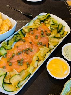 Una foto de Carpaccio de Salmón