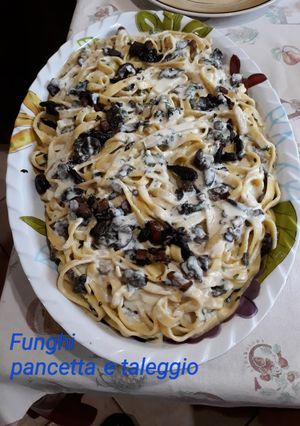 A picture of Tagliatelle with Mushrooms and Pancetta in Taleggio Fondue.