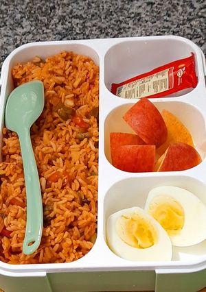 A picture of Veg Biryani With Boiled Egg.