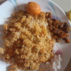 A picture of Prawn briyani and spicy prawn fry.