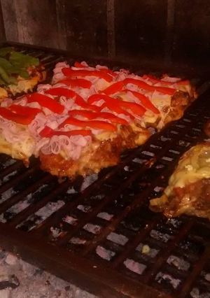 Una foto de Pollo a la pizza