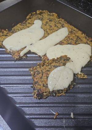 Una foto de Pizza de quinoa y vegetales