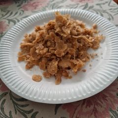 A picture of Meethi choori(roti flakes cooked in ghee and jaggery).