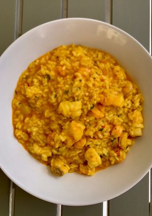 Una foto de Arroz meloso de rape y gambas