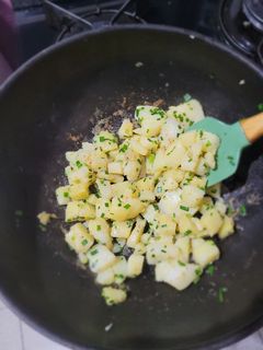 Una foto de Papas salteadas al ciboulette