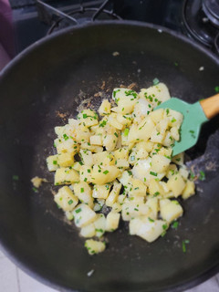 Una foto de Papas salteadas al ciboulette
