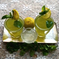 A picture of AloeVera, mint and lemon juice.