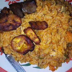 A picture of Jollof rice and plantain.