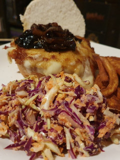 A picture of Mozzrella Burger with Caramelized Onions and Mushrooms.