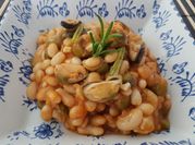 Una foto de mejillones en escabeche
