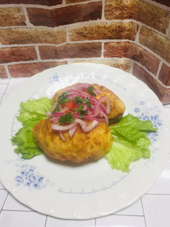 Una foto de Yuca rellena con carne molida!!