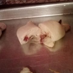 A picture of Cheese and bacon 🥓 cresant rolls.