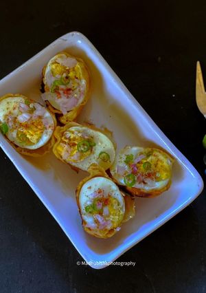 A picture of Masala Egg Bonda.