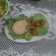 A picture of Popcorn chicken with Ramoulade sauce.