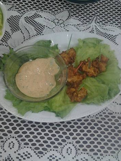 A picture of Popcorn chicken with Ramoulade sauce.