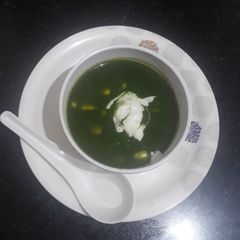 A picture of Spinach corn soup.