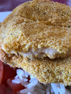 Una foto de Milanesas rebozadas en polenta