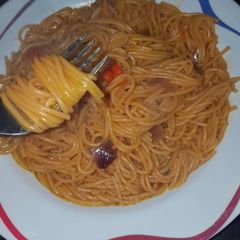A picture of Jollof spaghetti.