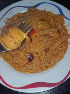 A picture of Jollof spaghetti.
