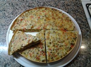 Una foto de Tarta de arvejas quiche