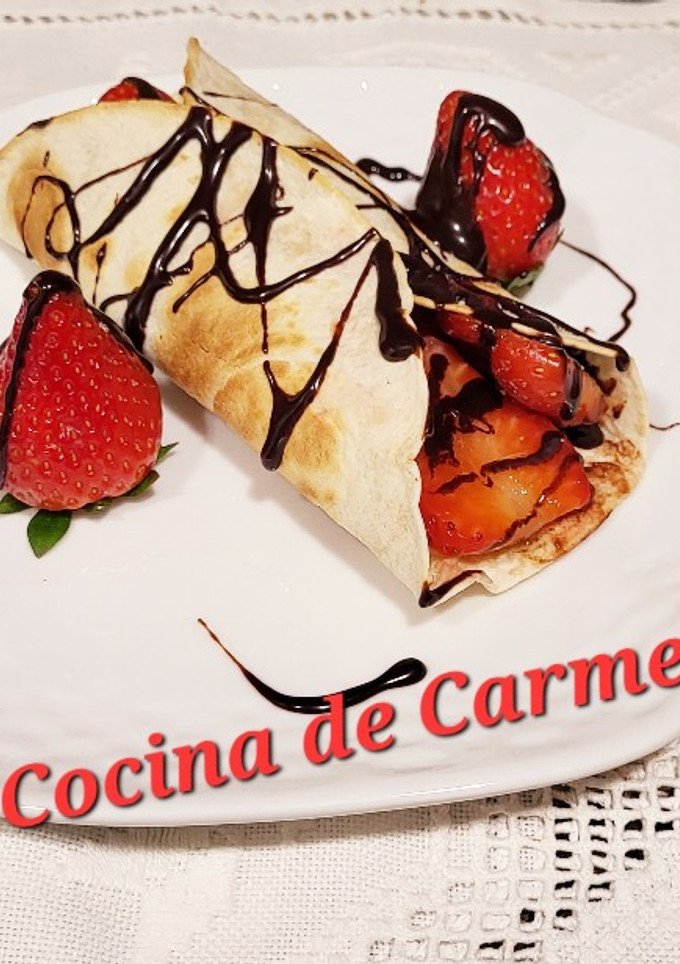 Una foto de Fresas con chocolate en tortita crujiente 🍓🍓