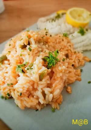 Une photo de Riz sauce tomate et poivrons au Cook Expert