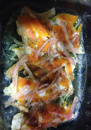 Una foto de Merluza en papillote con zanahorias y puerro