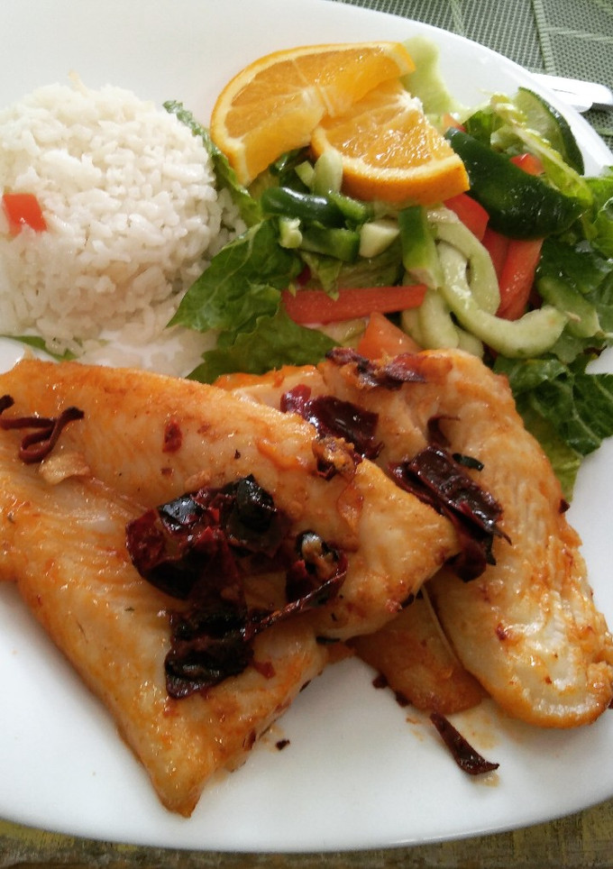 Una foto de Filete de Pescado al Ajillo