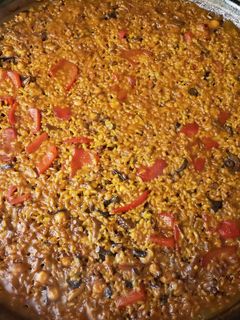Una foto de Arroz con pulpo a la leña