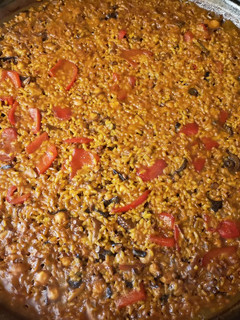 Una foto de Arroz con pulpo a la leña