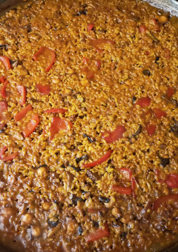 Una foto de Arroz con pulpo a la leña