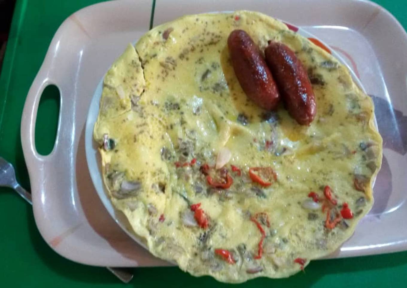 Fried eggs with sausages