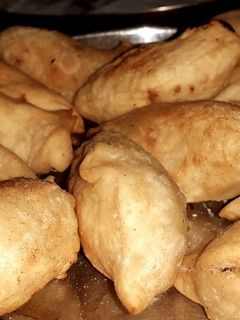 নারকেলের ভাজা পিঠে (narkeler bhaja pithe recipe in Bengali) রেসিপির প্রধান ছবি