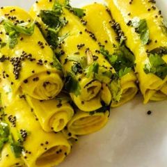 A picture of Gujjus snack Khandvi.