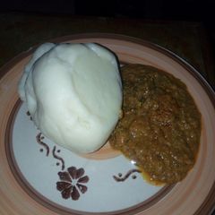 A picture of Pounded yam with beans soup.