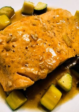 A picture of Salmon and zucchini braised in oyster sauce.