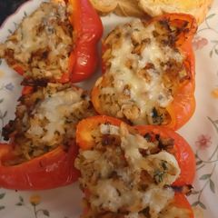 A picture of Air Fryer Chicken and rice stuffed bell peppers.