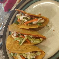 A picture of Whizzle grilled fish tacos with thug kitchen slaw.