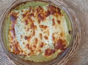 Una foto de enchiladas gratinadas