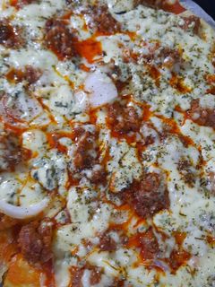Una foto de Pizza casera de picadillo