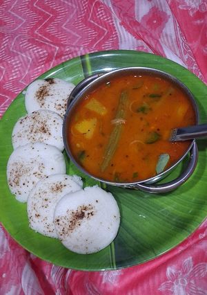 A picture of Sambhar with idli.