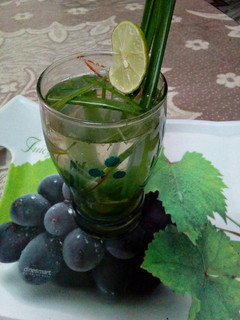 A picture of Lemon grass and lemon drink.
