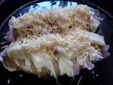 Papas al horno rellenas con jamón y queso