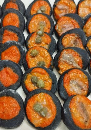 A picture of Rustic Mini Pizzas with Activated Charcoal.