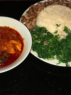 A picture of Veggie rice and beans with fish stew.